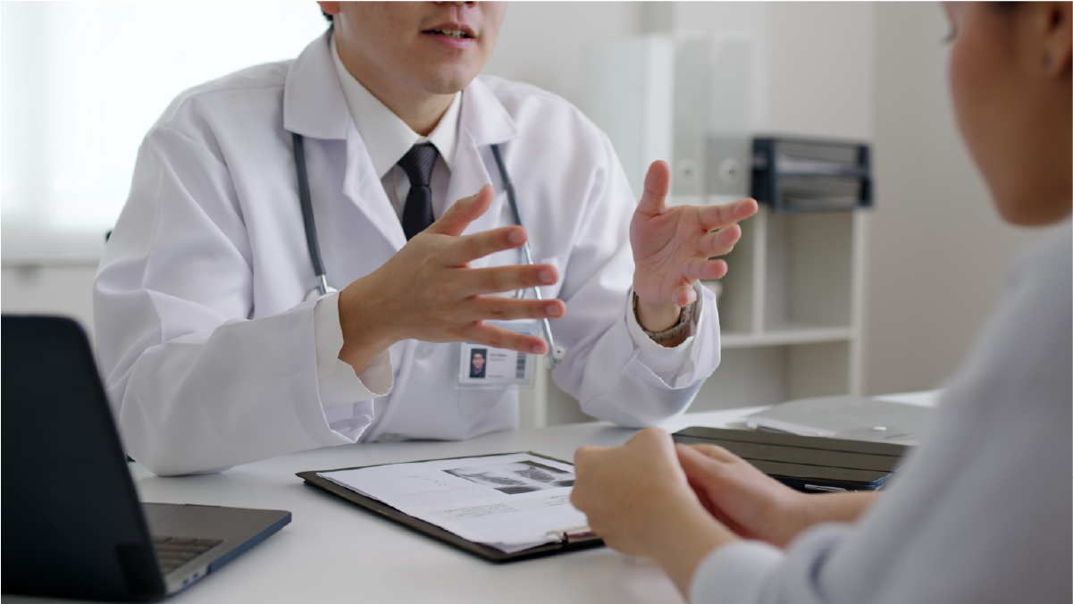 A doctor talking to his client