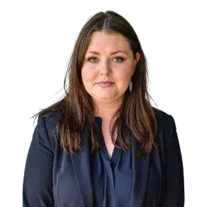A professional headshot of a woman.