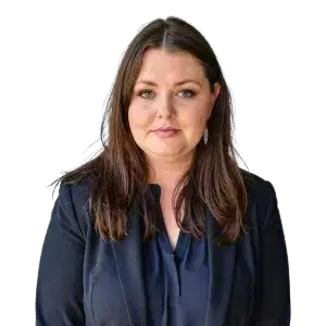 A professional headshot of a woman.