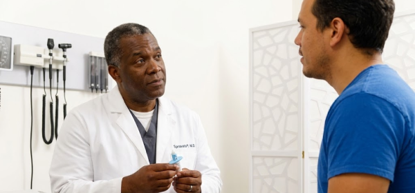 TRT doctor speaking with patient